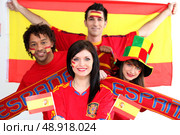 Group of Spanish soccer fans. Стоковое фото, агентство Ingram Publishing / Фотобанк Лори