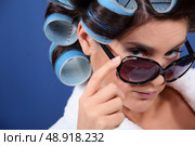 young woman with curlers in her hair. Стоковое фото, агентство Ingram Publishing / Фотобанк Лори