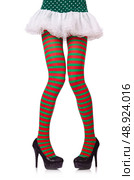 Woman legs in striped stockings on white. Стоковое фото, агентство Ingram Publishing / Фотобанк Лори