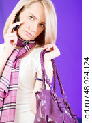 Blond girl talking on mobile phone. Стоковое фото, агентство Ingram Publishing / Фотобанк Лори
