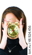 Woman with clock isolated on the white. Стоковое фото, агентство Ingram Publishing / Фотобанк Лори