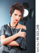 Young attractive girl with in the studio shooting. Стоковое фото, агентство Ingram Publishing / Фотобанк Лори