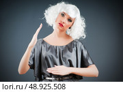 Blonde puppet in studio shooting. Стоковое фото, агентство Ingram Publishing / Фотобанк Лори