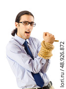 Young businessman tied with rope. Стоковое фото, агентство Ingram Publishing / Фотобанк Лори