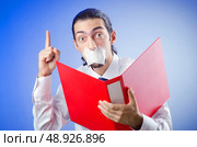 Businessman with his lips sealed. Стоковое фото, агентство Ingram Publishing / Фотобанк Лори