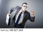 Industrial espionate concept with masked businessman. Стоковое фото, агентство Ingram Publishing / Фотобанк Лори