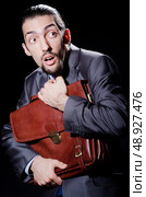 Business spy with briefcase. Стоковое фото, агентство Ingram Publishing / Фотобанк Лори