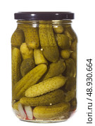 Can of cucumbers isolated on the white background. Стоковое фото, агентство Ingram Publishing / Фотобанк Лори