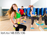 zumba dance cardio people group training at fitness gym workout exercise. Стоковое фото, агентство Ingram Publishing / Фотобанк Лори