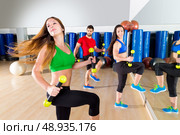 zumba dance cardio people group training at fitness gym workout exercise. Стоковое фото, агентство Ingram Publishing / Фотобанк Лори