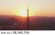 Sofia, Bulgaria-05 05 2025:Cinematic Aerial View of Sofia Bulgaria at Sunset TV Tower and Green City Parks in Golden Light. Редакционное видео, видеограф Mihail Mihaylov / Фотобанк Лори