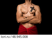 Athletic young man with tattoos and towel around his waist. Стоковое фото, агентство Ingram Publishing / Фотобанк Лори