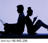 Young people addicted to the new technology. Стоковое фото, агентство Ingram Publishing / Фотобанк Лори