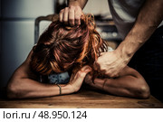 Young woman being the victim of domestic abuse. Стоковое фото, агентство Ingram Publishing / Фотобанк Лори