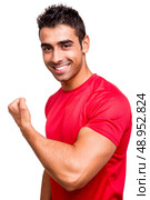 Man showing his great shape during exercise. Стоковое фото, агентство Ingram Publishing / Фотобанк Лори