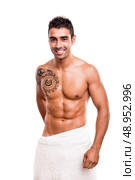 Attractive man posing with a white towel. Стоковое фото, агентство Ingram Publishing / Фотобанк Лори