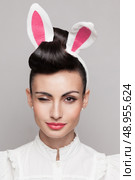 closeup of winking bunny girl face. Стоковое фото, агентство Ingram Publishing / Фотобанк Лори