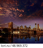Brooklyn Bridge sunset New York Manhattan skyline NY NYC USA. Стоковое фото, агентство Ingram Publishing / Фотобанк Лори