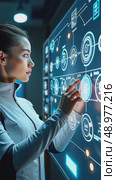 A person in a futuristic suit interacting with holographic tech elements, including digital icons and interfaces, front view, bright hi-tech background. Стоковое AI-видео, аниматор Sergey Grishin / Фотобанк Лори