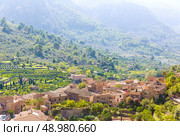 Fornalutx village aerial skyline in Majorca Balearic island Mallorca spain. Стоковое фото, агентство Ingram Publishing / Фотобанк Лори