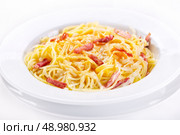 plate of pasta carbonara. Стоковое фото, агентство Ingram Publishing / Фотобанк Лори