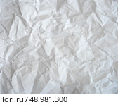 Texture of crumpled paper background. Creased paper texture. Vector illustration. Стоковая иллюстрация, агентство Ingram Publishing / Фотобанк Лори