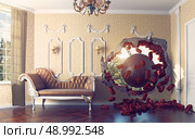 wrecking ball enters the room. 3d creative concept. Стоковое фото, агентство Ingram Publishing / Фотобанк Лори