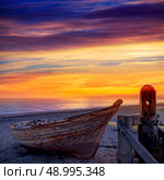 Almeria Cabo de Gata beached boats in San Miguel beach of Spain. Стоковое фото, агентство Ingram Publishing / Фотобанк Лори