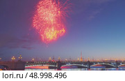 Saint-Petersburg, Russia - Jul 31 2022, 4k, beautiful fireworks, view on Trinity bridge and Peter and Paul fortress, Saint-Petersburg, Russia. Редакционное видео, видеограф Сергей Богомяко / Фотобанк Лори