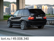 KRASNOYARSK, RUSSIA - May 23, 2025: Black BMW X5 E53. Редакционное фото, фотограф Плотников Дмитрий / Фотобанк Лори