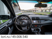 KRASNOYARSK, RUSSIA - May 23, 2025: Black BMW X5 E53. Редакционное фото, фотограф Плотников Дмитрий / Фотобанк Лори