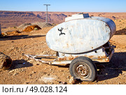 water tank in morocco africa land gray  metal weel and arid. Стоковое фото, агентство Ingram Publishing / Фотобанк Лори
