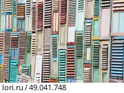 Restaurant made from colourful wooden shutters. Стоковое фото, агентство Ingram Publishing / Фотобанк Лори