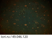 Vintage dark green retro wallpaper with a floral pattern with rumples and scratches. Retro green background. Стоковое фото, фотограф Лазаренко Светлана / Фотобанк Лори