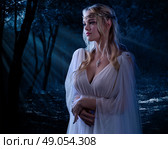 Young elven girl in night forest. Стоковое фото, агентство Ingram Publishing / Фотобанк Лори