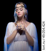 Young elven girl isolated on black. Стоковое фото, агентство Ingram Publishing / Фотобанк Лори