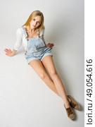 Young girl on grey background. Стоковое фото, агентство Ingram Publishing / Фотобанк Лори