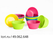 baking silicone cups for cupcakes or muffins on white background. Стоковое фото, агентство Ingram Publishing / Фотобанк Лори