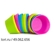 baking silicone cups for cupcakes or muffins on white background. Стоковое фото, агентство Ingram Publishing / Фотобанк Лори