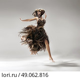 Young lady wearing dress made of hair. Стоковое фото, агентство Ingram Publishing / Фотобанк Лори