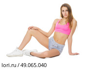Young girl in jeans shorts isolated. Стоковое фото, агентство Ingram Publishing / Фотобанк Лори