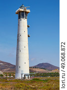 Morro Jable Matorral lighthouse Jandia in Pajara of Fuerteventura at Canary Islands. Стоковое фото, агентство Ingram Publishing / Фотобанк Лори