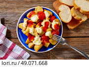 Tapas Patatas Bravas potatoe fries with tomato and mayonaise from Spain. Стоковое фото, агентство Ingram Publishing / Фотобанк Лори