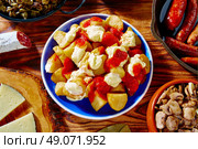 Tapas Patatas Bravas potatoe fries with tomato and mayonaise from Spain. Стоковое фото, агентство Ingram Publishing / Фотобанк Лори