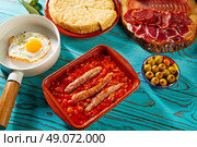 Tapas pisto con tomate ratatouille egg and sausage from Spain. Стоковое фото, агентство Ingram Publishing / Фотобанк Лори