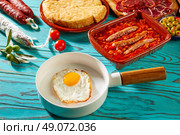 Tapas pisto con tomate ratatouille egg and sausage from Spain. Стоковое фото, агентство Ingram Publishing / Фотобанк Лори