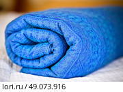 closeup of rolled blue baby sling. Стоковое фото, агентство Ingram Publishing / Фотобанк Лори