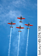 four airplanes in formation on airshow. Стоковое фото, агентство Ingram Publishing / Фотобанк Лори