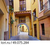 Valencia Portal de Valldigna arch in barrio del Carmen at Spain. Стоковое фото, агентство Ingram Publishing / Фотобанк Лори
