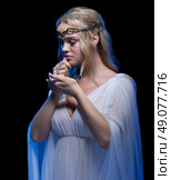 Young elven girl isolated on black. Стоковое фото, агентство Ingram Publishing / Фотобанк Лори
